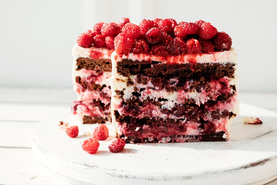 Protein cubed cake with chocolate and raspberries